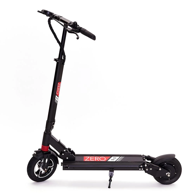 Commuter riding ZERO 8 scooter through city bike lane